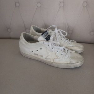 All white Golden Goose women’s size 9 shoe. Worn twice. Excellent condition.